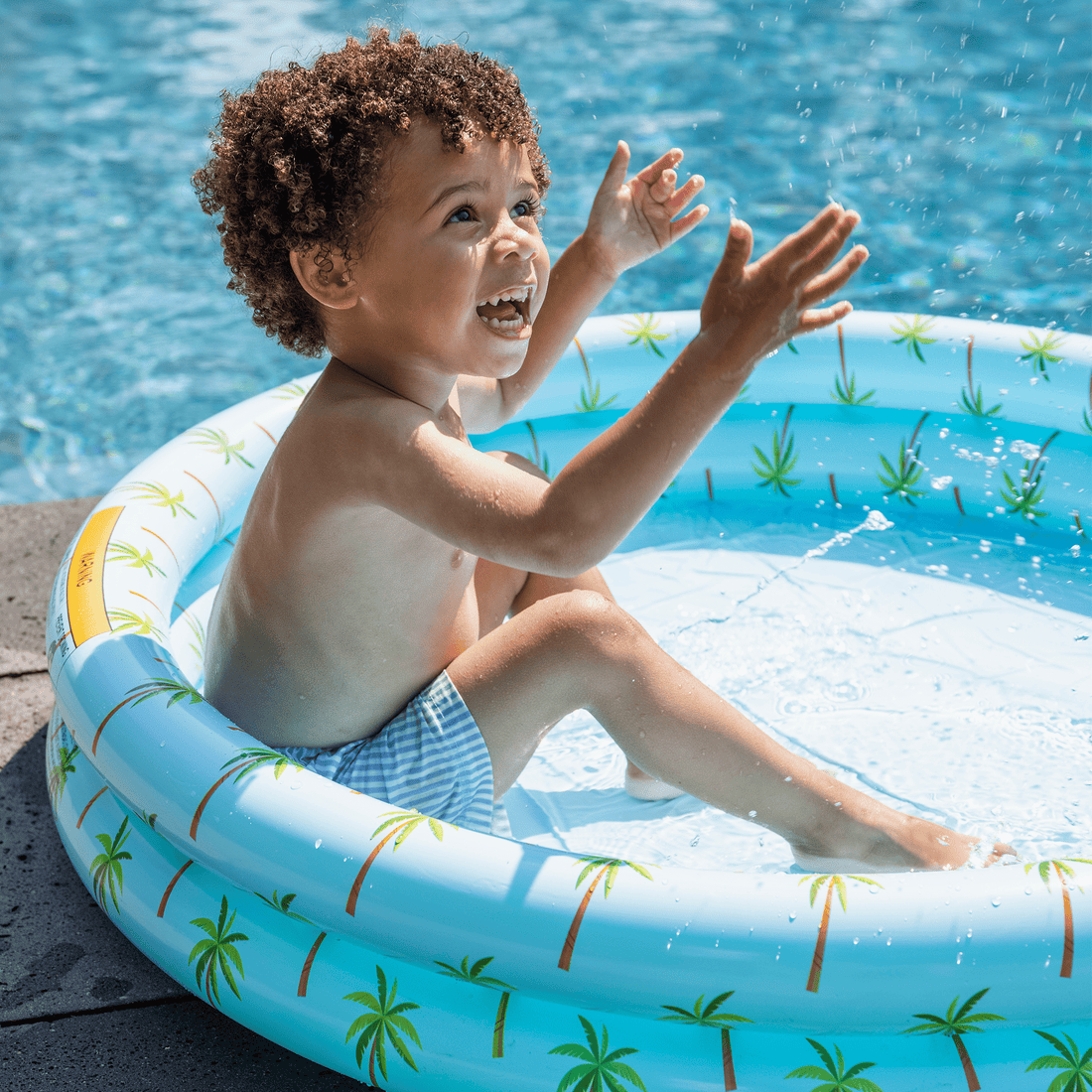 baby-zwembad-blauw-met-palmbomen-100-cm-swim-essentials-1