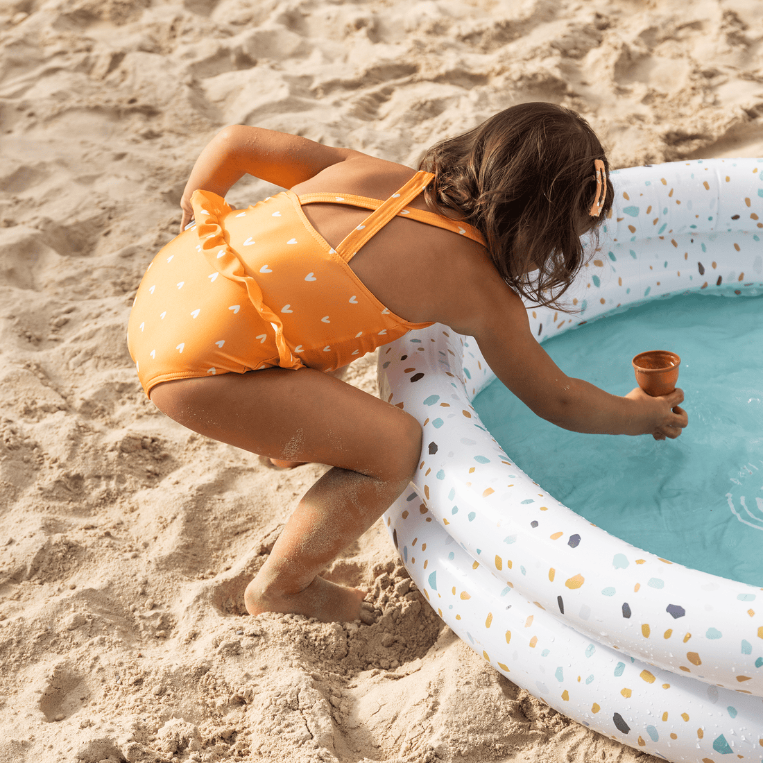 UV-meisjes-badpak-oranje-met-hartjes-swim-essentials-1